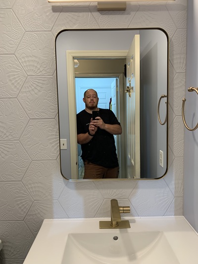 A picture of the tile installer